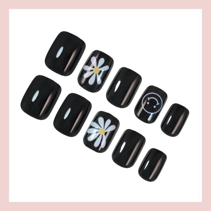 Kunstnagelset mit kreativen Blumen- und Uhrenmotiven Brehn