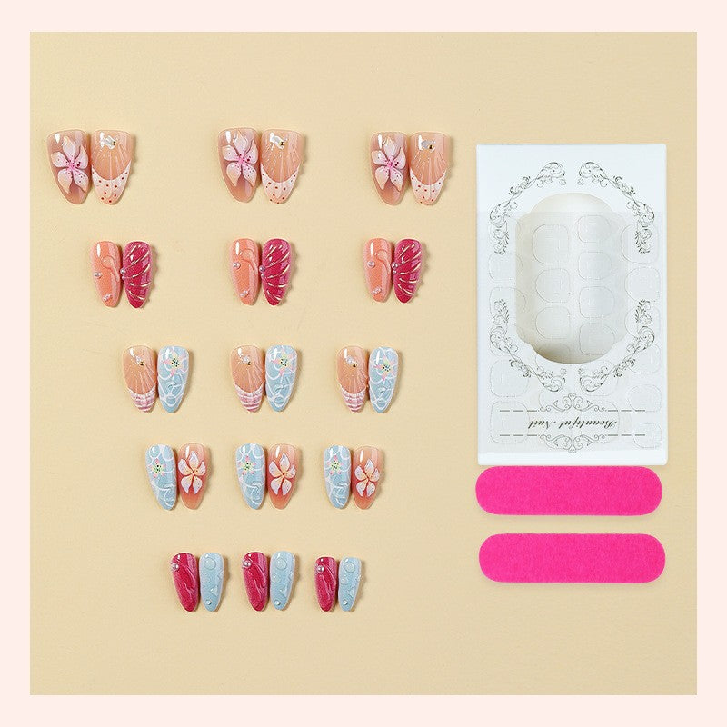 Kunstnagelset mit floralem 3D-Design und Glitzerakzenten Brehn