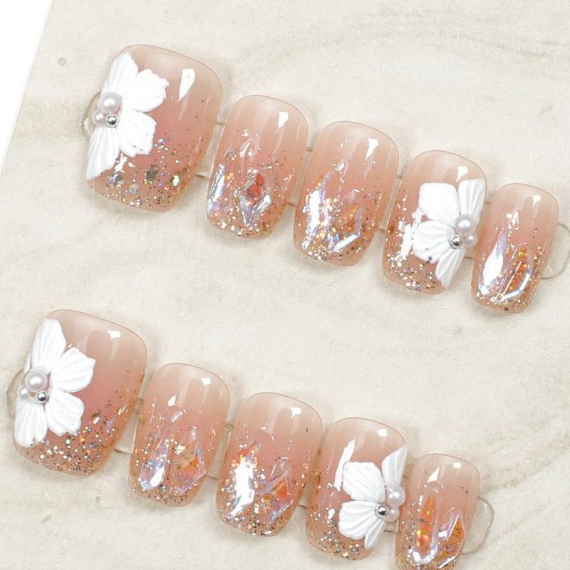 Künstlerisch florales, verziertes Press-On Nageldesign Brehn