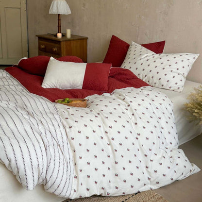 Wendbares Baumwoll-Bettwäscheset mit gestepptem Quilt und feinem Blumenminiprint