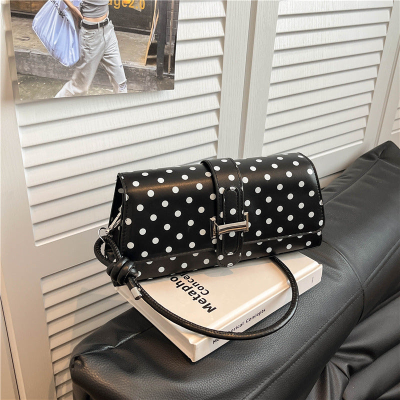Punktemuster Clutch Handtasche