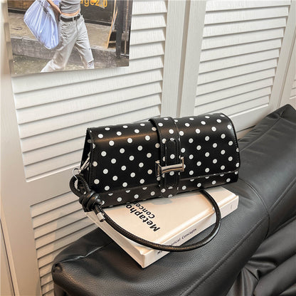 Punktemuster Clutch Handtasche