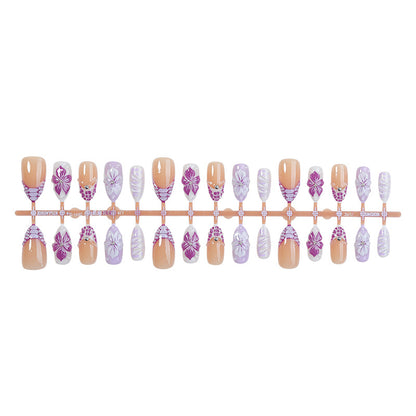 Kunstnagelset mit eleganten Blumen-Designs und Glitzerakzenten Brehn