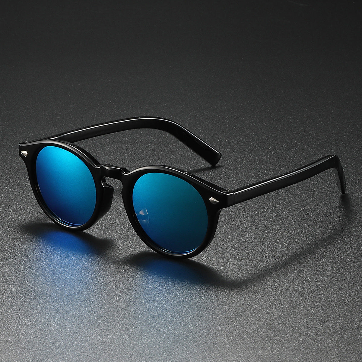Damen Rund-Sonnenbrille mit transparentem Rahmen und reflektierenden Gläsern Brehn
