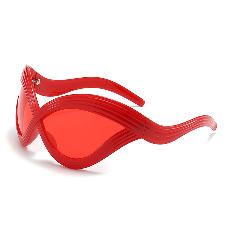 Damen außergewöhnliche Sonnenbrille mit geschwungenem Design Brehn