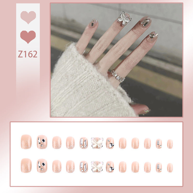 Dekoratives Press-On Nagelset mit Schmetterlingsakzenten Brehn