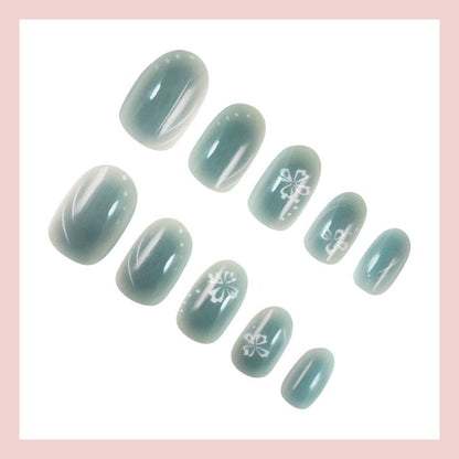 Kunstnagelset mit floralen Verzierungen und glanzvollem Finish Brehn