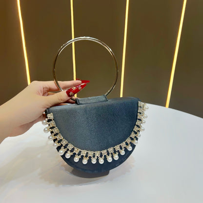 Perlenakzentierte Abend-Clutch