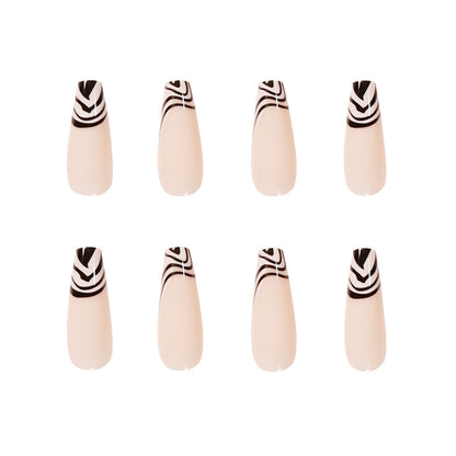 Kunstvolle Nagelverlängerungen mit elegantem Schwarz-Weiß-Muster Brehn