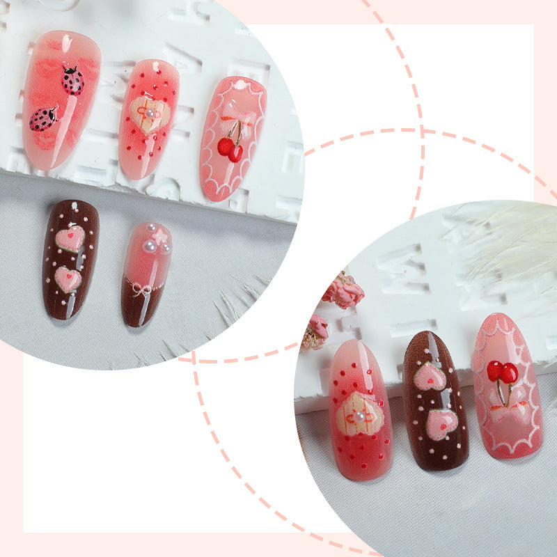 Kunstnagelset mit floralen und verspielten Tee-Motiven Brehn