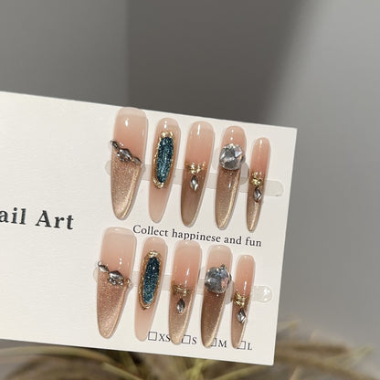 Dekoratives Press-On Nagelkunstset mit Edelsteinverzierungen