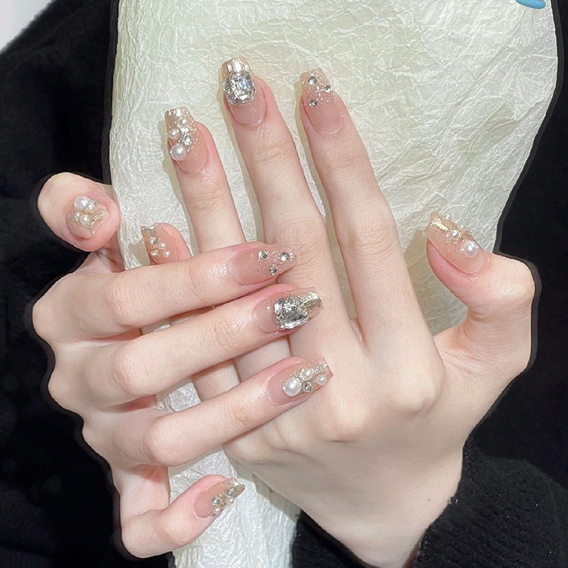 Kunstnagelset mit elegantem Perl- und Glitzerdesign Brehn