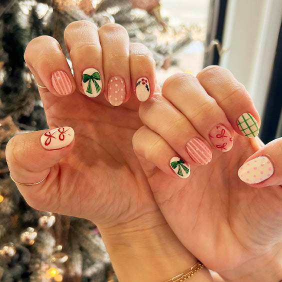 Kunstnagelset mit festlichen Schleifen- und Weihnachtsmotiven Brehn