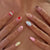 Kunstnagelset mit kreativen und farbenfrohen Designs Brehn