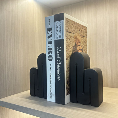 Künstlerischer abstrakter Buchstütze