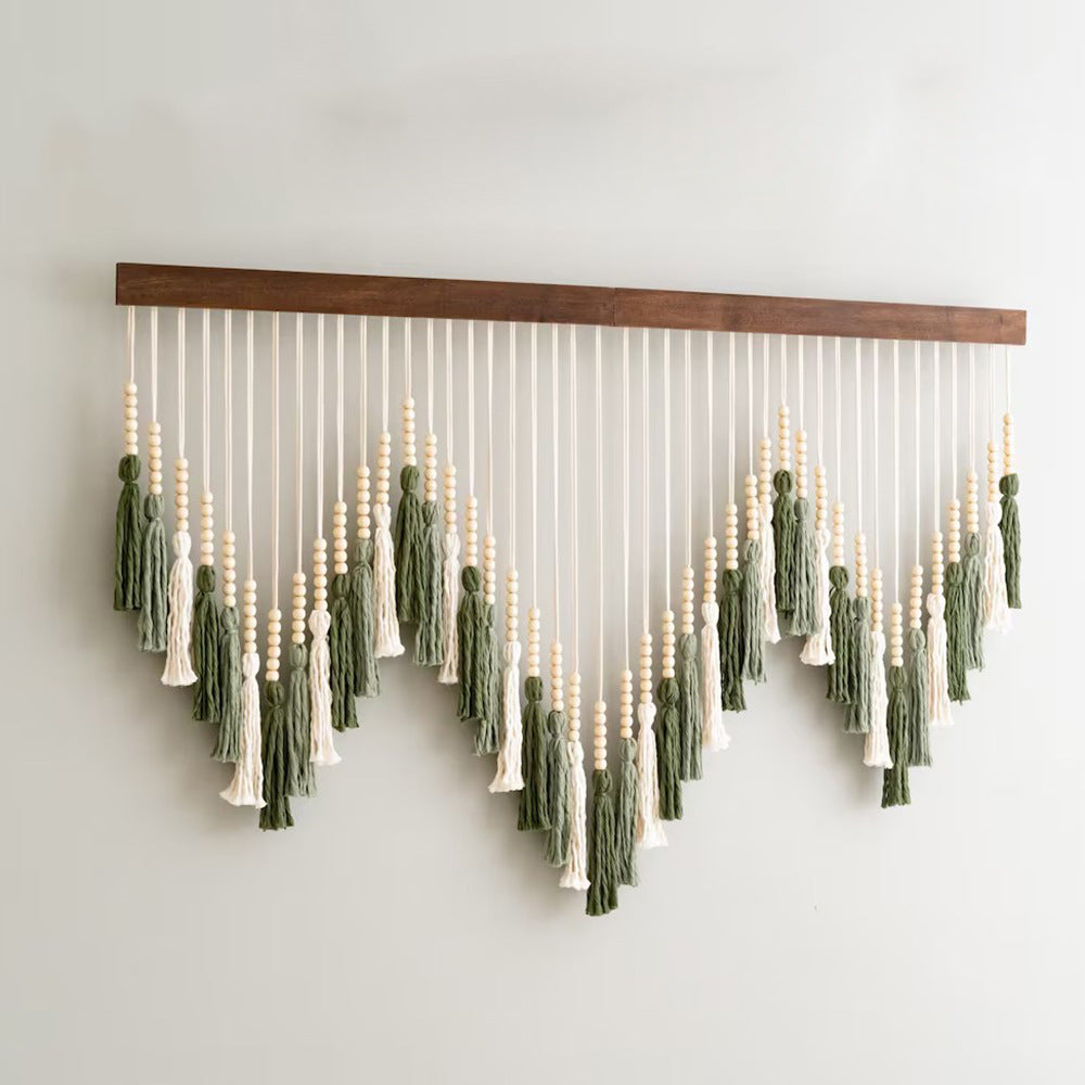 Künstlerisches Makramee-Wandbehang mit Farbverlaufs und eleganten Quasten