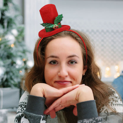 Weihnachts-Haarreif mit Weihnachtsmannhut und Pflanzenmotiv
