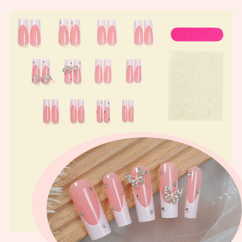 Dekorativer Press-On Nail Kit mit Schmetterlingsakzenten Brehn