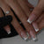 Kunstnagelset mit elegantem Design und Glitzer-Akzenten Brehn