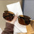 Sleek Shield Sonnenbrille mit Sternelement Brehn