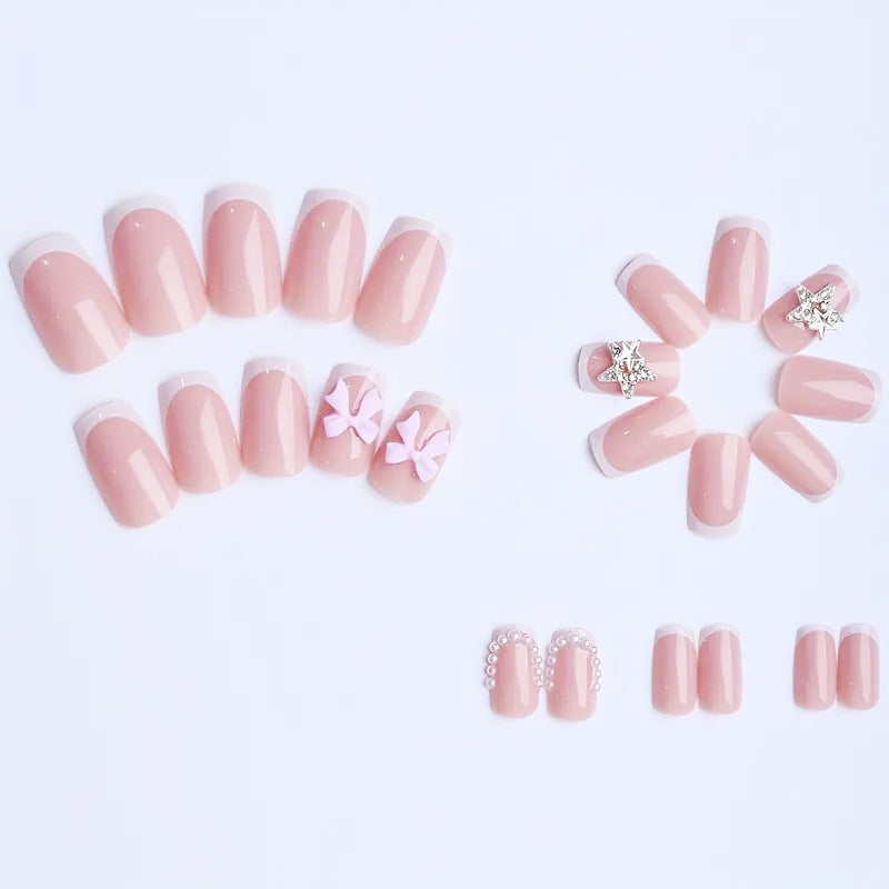 Künstliche Nagelspitzen mit glamourösem Schleifen und Strass-Design Brehn