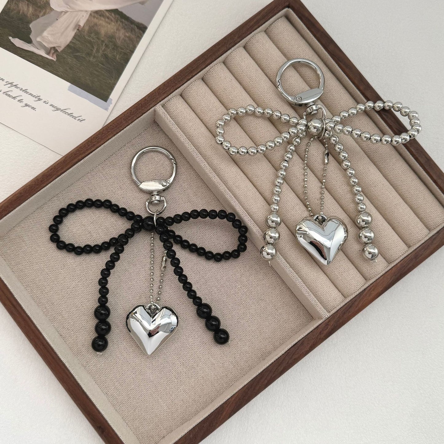 Eleganter Perlencharms-Schlüsselanhänger Brehn
