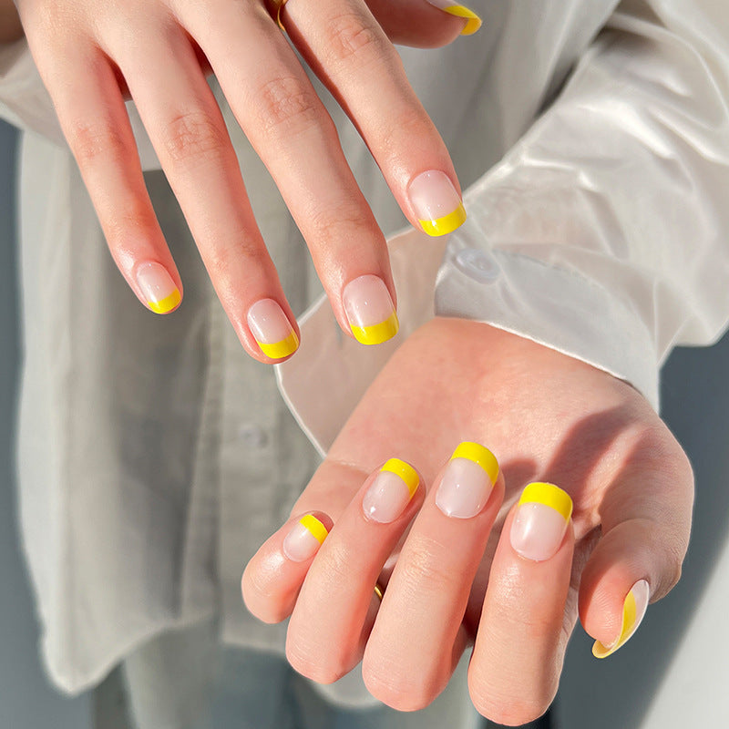 Kunstvolle Nagelkunst mit frischem Gelb Akzent Brehn