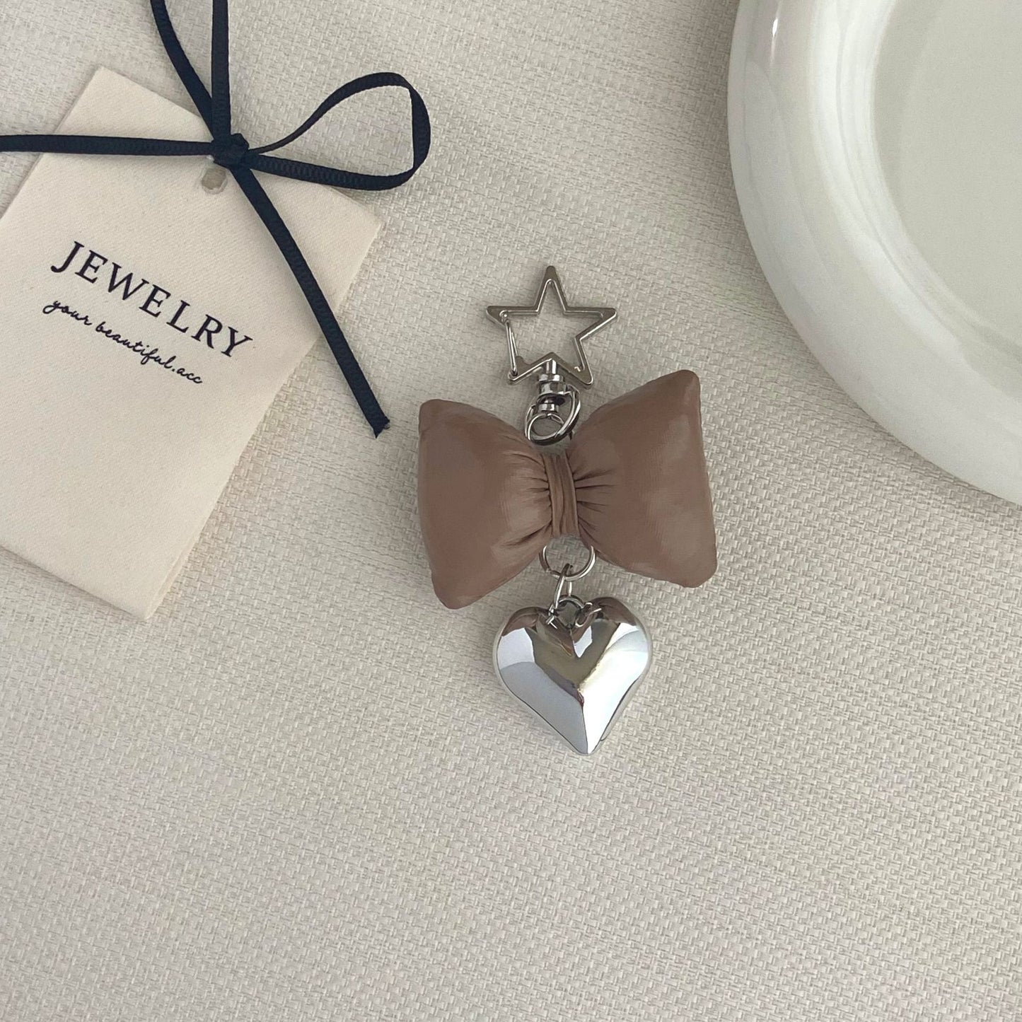 Bow-förmiger Charm Schlüsselanhänger Brehn