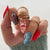 Kreatives Kunstnagelset mit festlichen Weihnachts-Designs und Glitzerakzenten Brehn