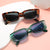Damen Modische Sonnenbrille mit luxuriösem Tortoise-Design und goldenen Akzenten Brehn