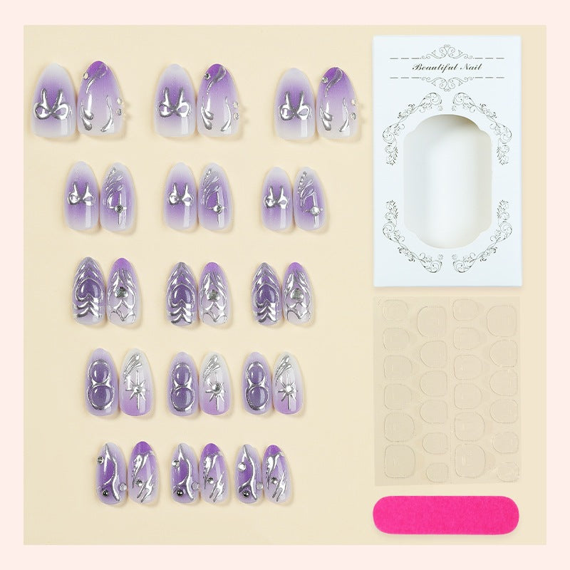 Kunstnagelset mit elegantem Ombre-Design und filigranen Verzierungen Brehn
