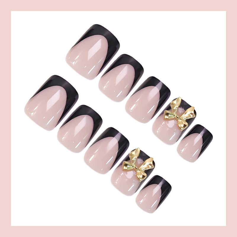 Kunstnagelset mit stylishen und eleganten Schwarz-Spitzen Brehn