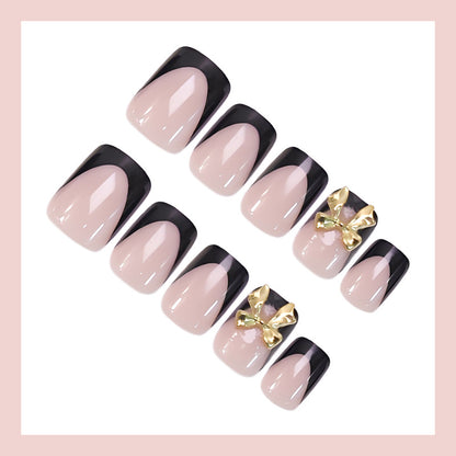 Kunstnagelset mit stylishen und eleganten Schwarz-Spitzen Brehn