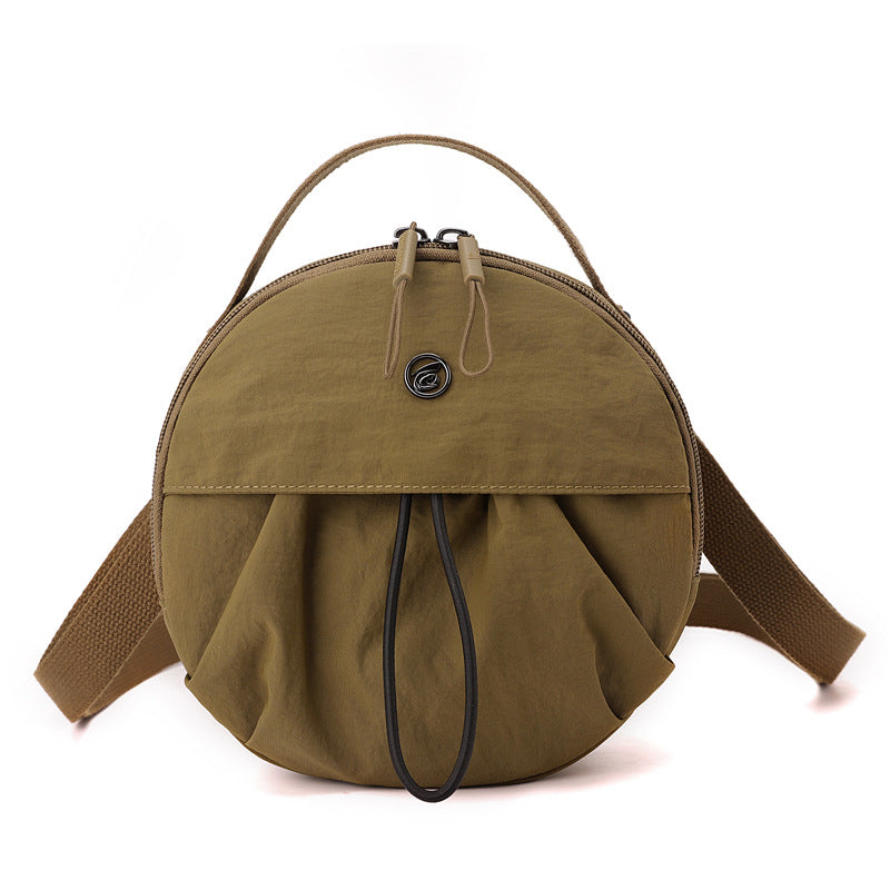 Runde Crossbody-Tasche Brehn