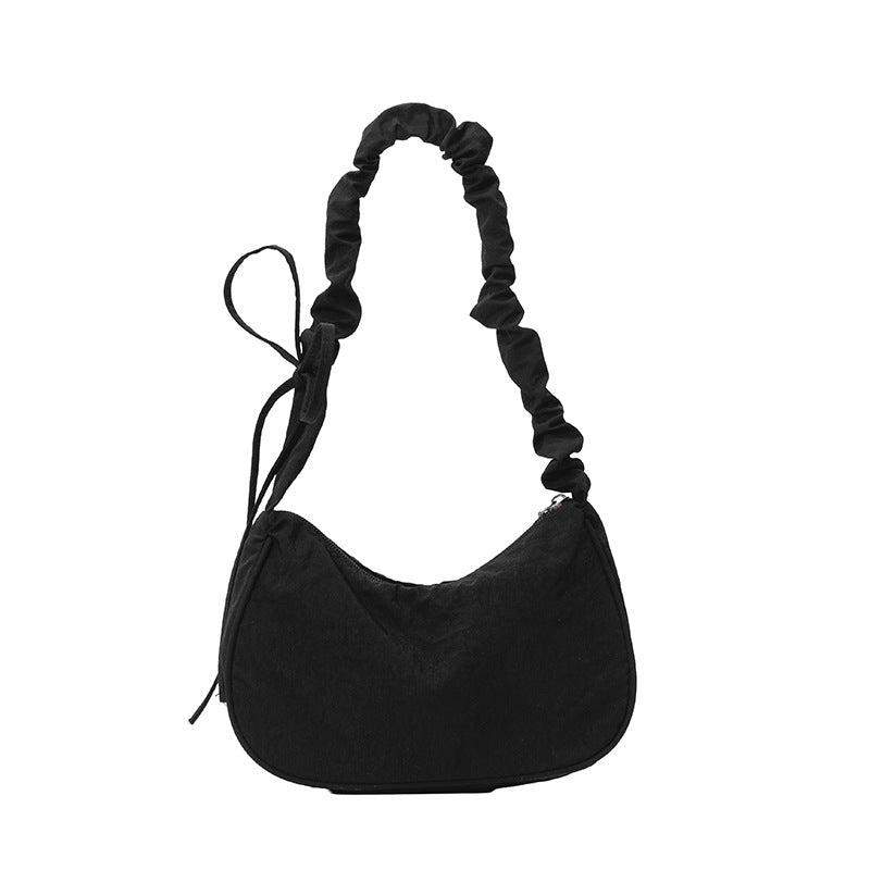 WoTexturiertes Stoff Sling Bag Brehn