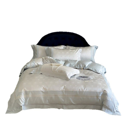 Luxuriöses Satin-Jacquard Blüten-Bettwäsche-Set mit bestickten Kopfkissenbezügen