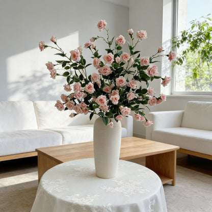 Lebensechte rosa Rosen Blumenarrangement
