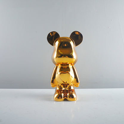 Dekorative Goldene Bärenfigur