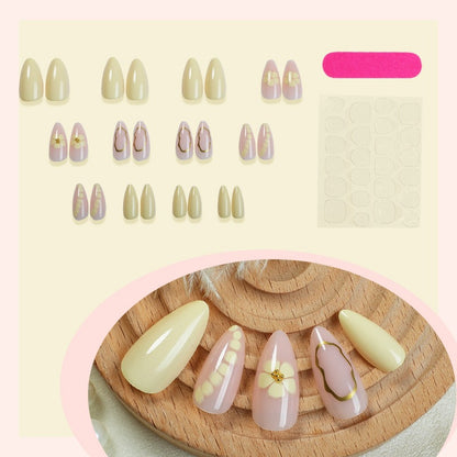 Kunstnagelset mit glitzernden Blumenmotiven Brehn