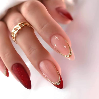Kunstnagelset mit luxuriösen Glitzerverzierungen und starren Spitzen Brehn