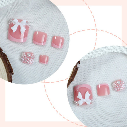 Kunstnagelset mit romantischen Schleifen-Design Brehn