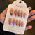 Künstlerisches Press-On Nageldesign-Set Brehn