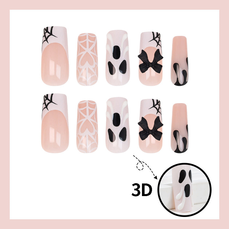 Kunstnagelset mit Halloween-Motiv und verspielten Verzierungen Brehn