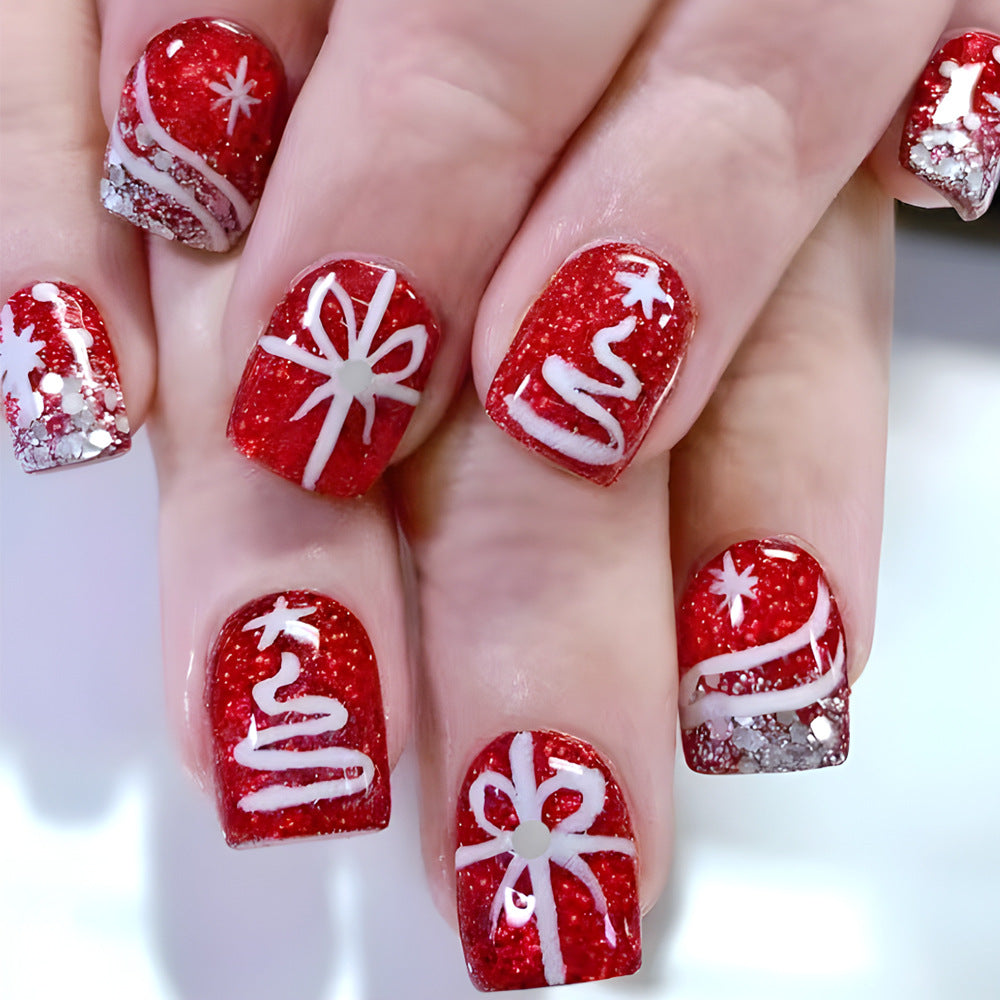 Festliche Glitter-Nagelkunst-Designs Brehn