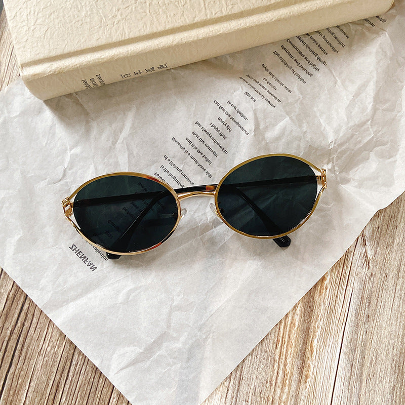 Runde Sonnenbrille mit Goldenen Akzenten Brehn
