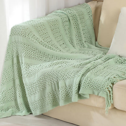Gemütliche Strickwurfdecke