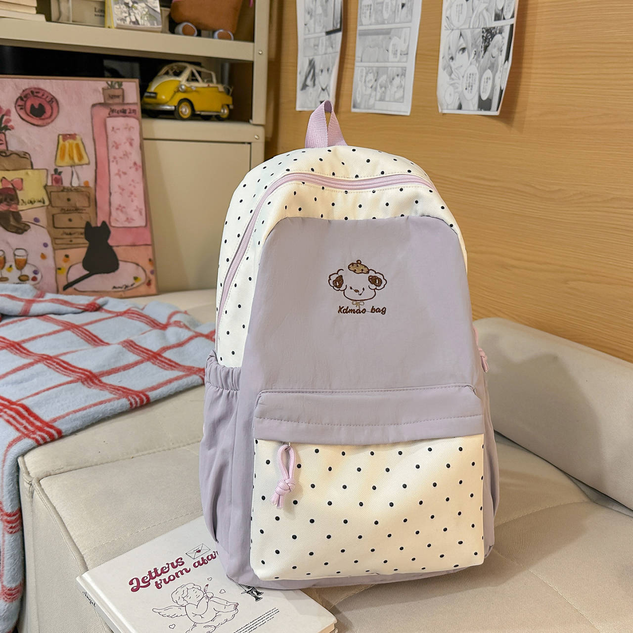 Spielerischer gepunkteter Rucksack Brehn