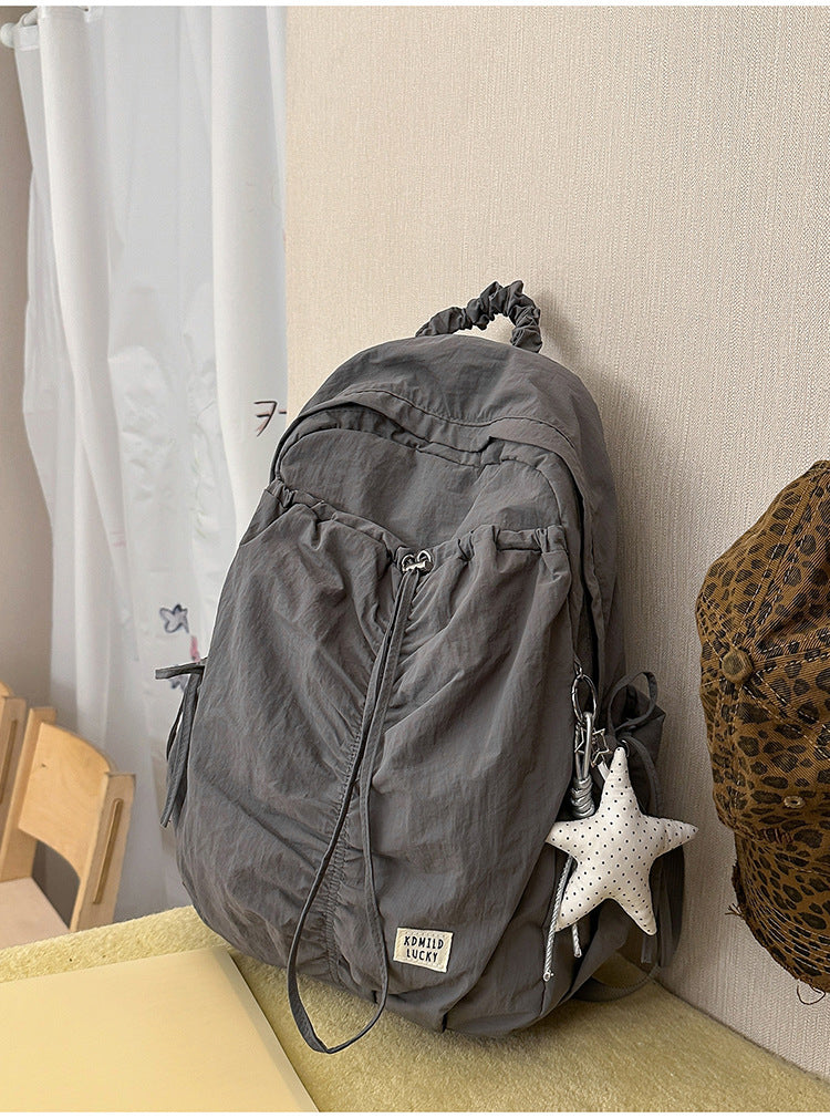 Lässiger zerknitterter Stoff-Schulrucksack