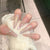 Premium dekorative Press-On Nagelset mit eleganten Edelsteindekoren Brehn