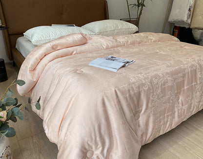 Extraleichte Satin-Jacquard-Steppdecke mit dezenter Knopfsteppung